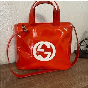 In Search of this Gucci Orange Patent Leather Tote Bag